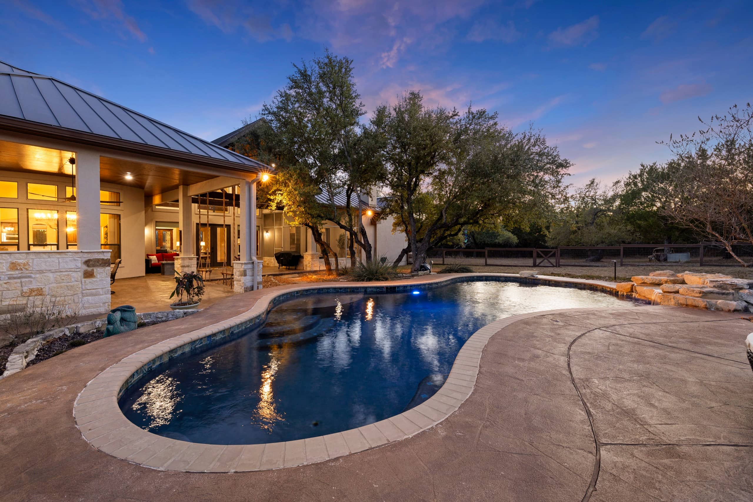 Twilight pool and patio at a Texas Hill Country home