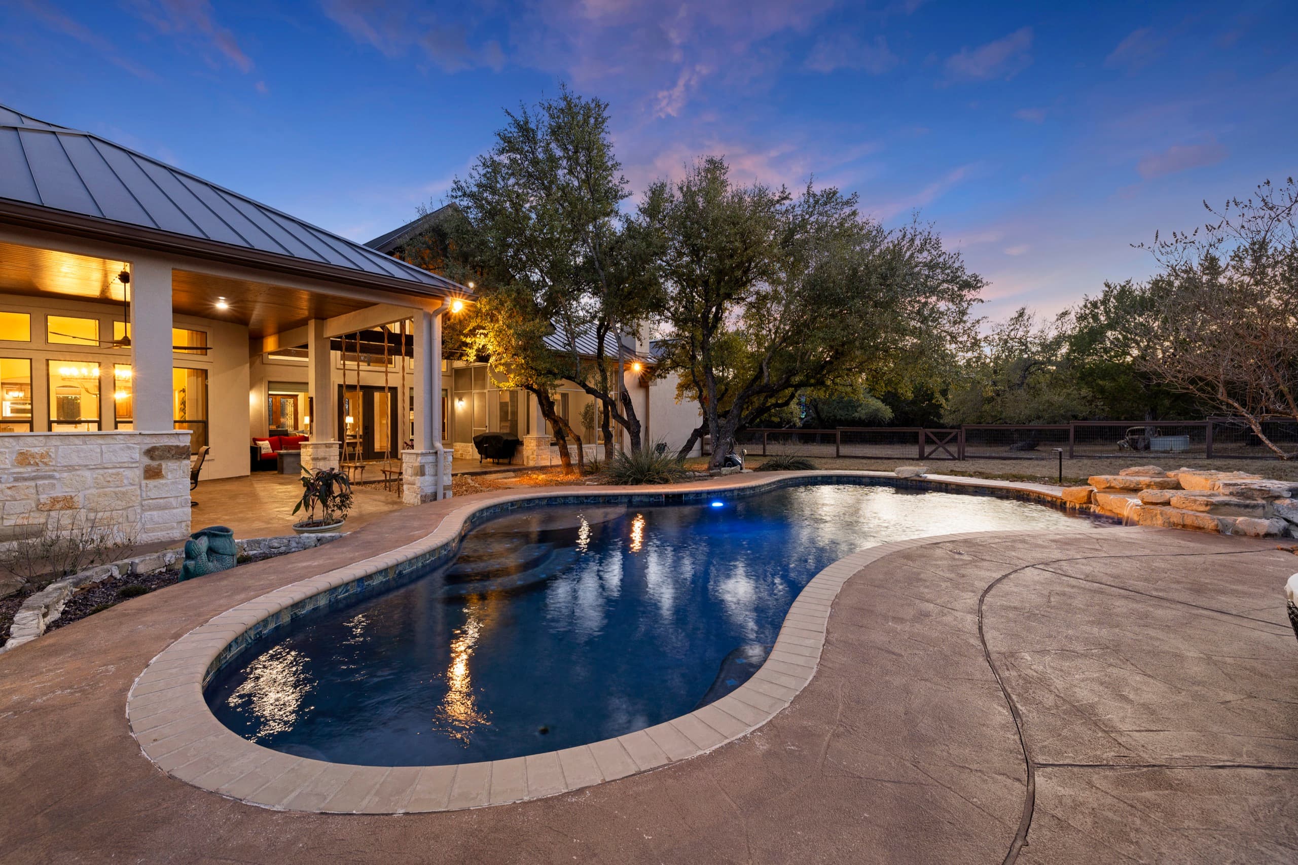 Twilight pool and patio, Texas Hill Country home