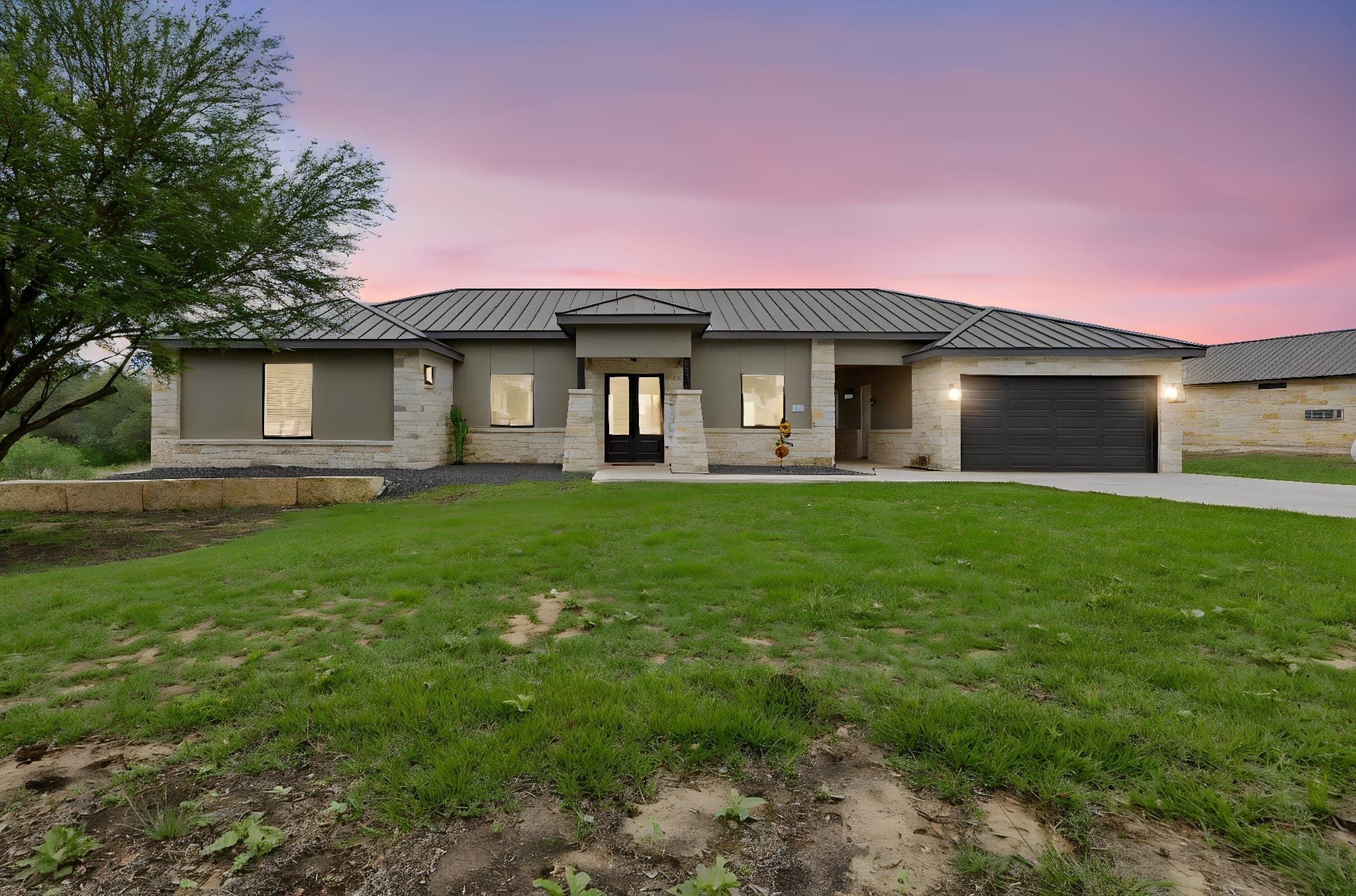 Contemporary Hill Country home photographed at twilight